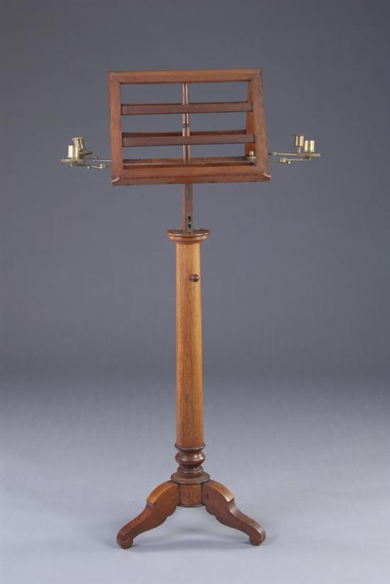 Appraisal: VICTORIAN DUET MUSIC STAND late th century fruitwood With four