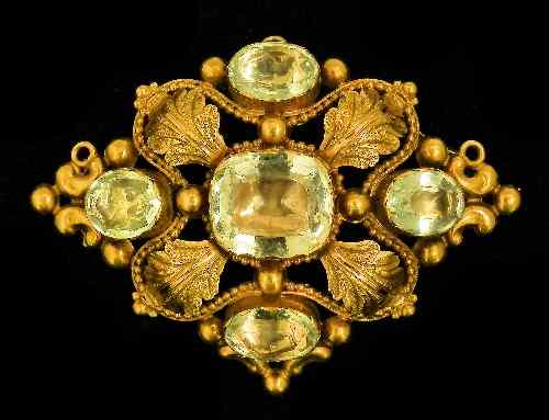 Appraisal: A late Victorian gold coloured metal mounted aquamarine set brooch