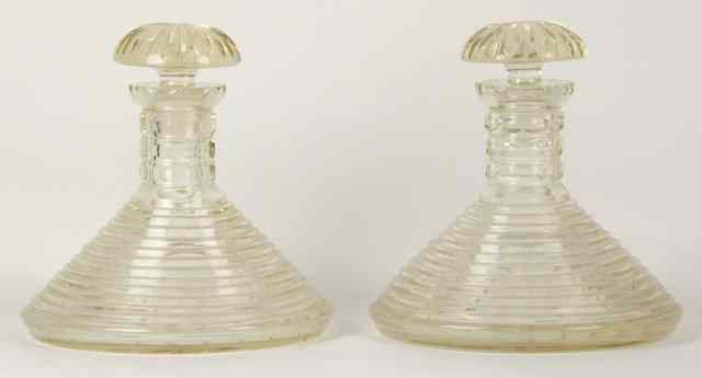 Appraisal: A pair of th Century glass ship decanters each cut