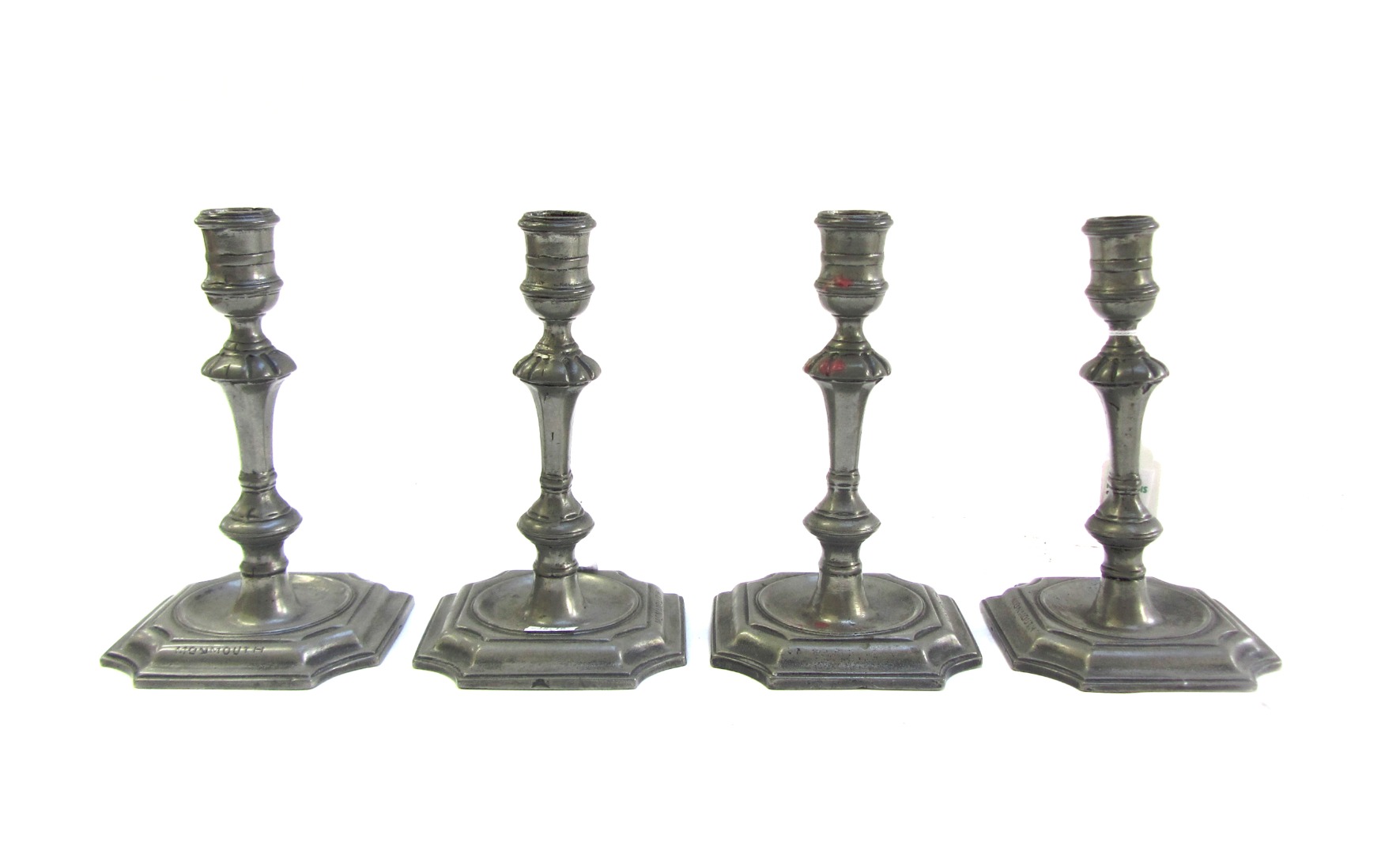 Appraisal: A set of four th century pewter candlesticks each stamped