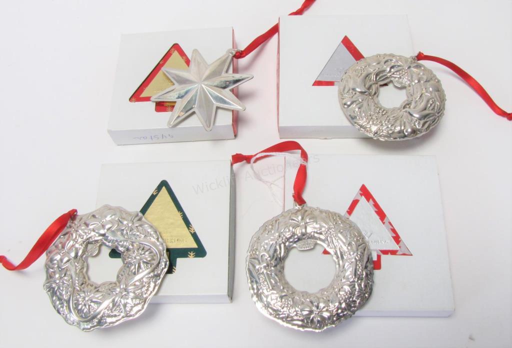 Appraisal: Four Wallace sterling annual ornaments including Christmas star wreath wreath