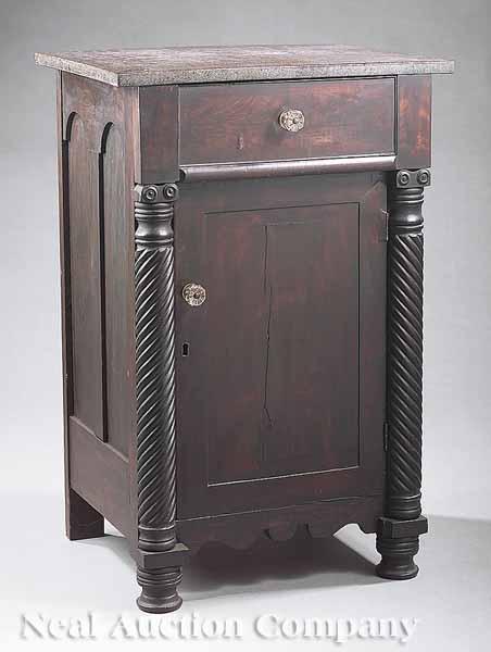 Appraisal: An American Pedestal Cabinet the later top above a frieze