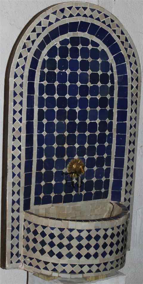 Appraisal: MOSAIC BLUE AND WHITE TILED WALL FOUNTAIN with arched back