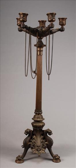 Appraisal: A Napoleon III patinated bronze five light candelabrum in the