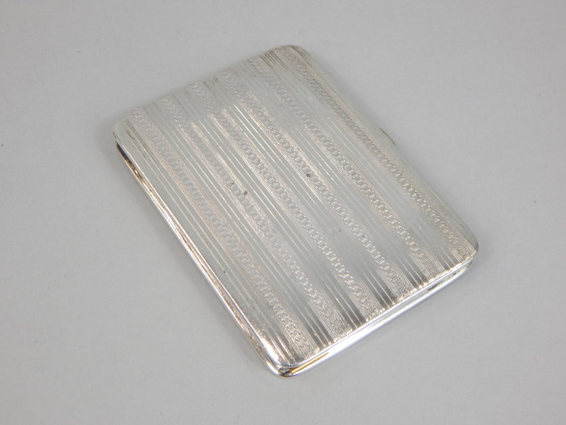 Appraisal: An engine turned Art Deco style small silver cigarette case