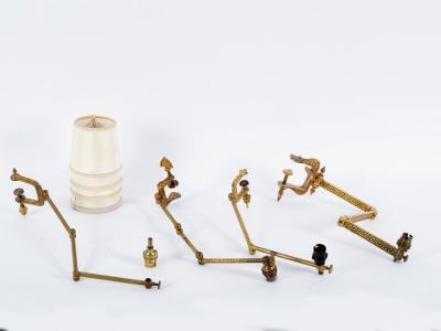 Appraisal: Four th Century brass extending candlesticks with cast screw attachments