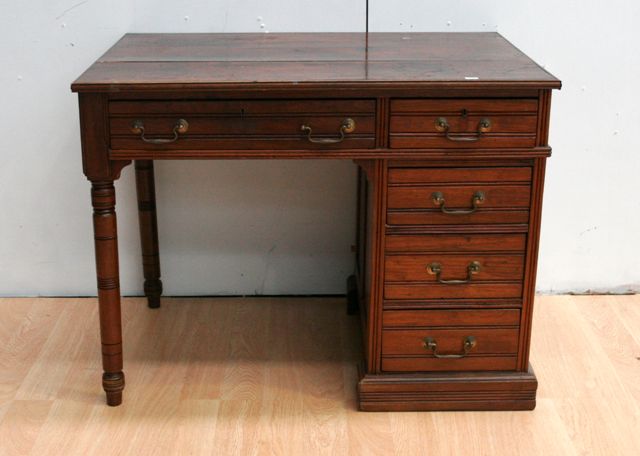 Appraisal: An Edwardian pine desk cm long cm wide cm tall