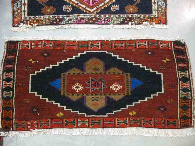 Appraisal: Kord Persian Handmade Rug geometric medallion deep colors ' x