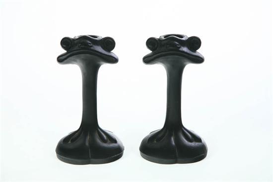 Appraisal: PAIR OF BLACK SATIN GLASS CANDLESTICKS Made by Tiffin and