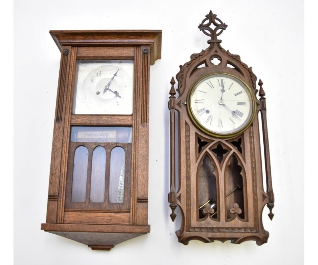 Appraisal: Arts Crafts oak calendar clock together with a mahogany Gothic