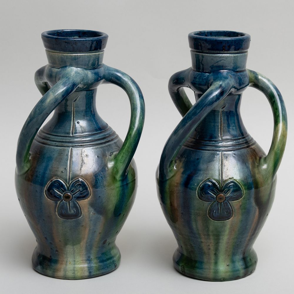 Appraisal: Pair of Belgian Pottery Vases Stamped mark in high Condition