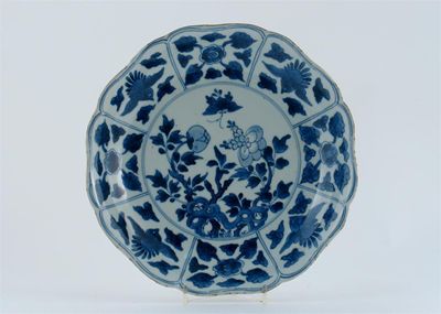 Appraisal: A Chinese blue and white moulded dish painted with four