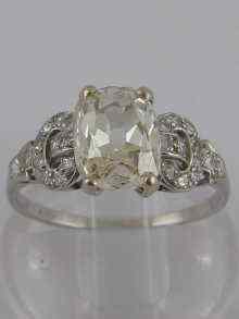 Appraisal: A platinum and diamond ring the principal old cut diamond