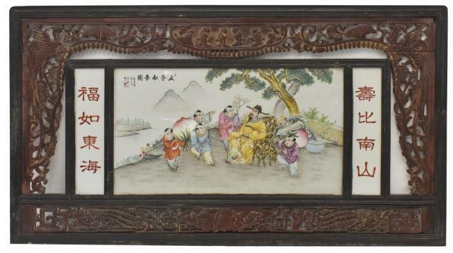 Appraisal: Large framed painted porcelain wall plaque housed in open-carved wood