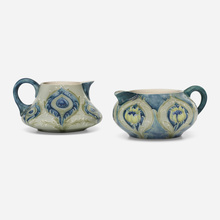 Appraisal: William Moorcroft for James Macintyre Co Transitional creamers with peacock