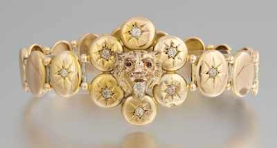 Appraisal: A Victorian Style Gold and Diamond Bracelet with Lion Design