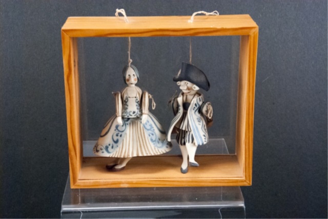 Appraisal: Two Porcelain Marionettes in Shadow Box Stamped on side of