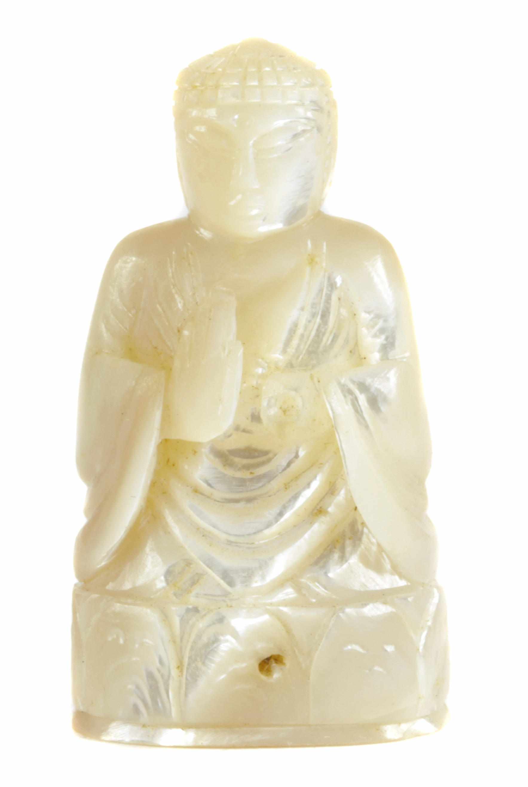 Appraisal: A miniature mother of pearl figure of Buddha height in