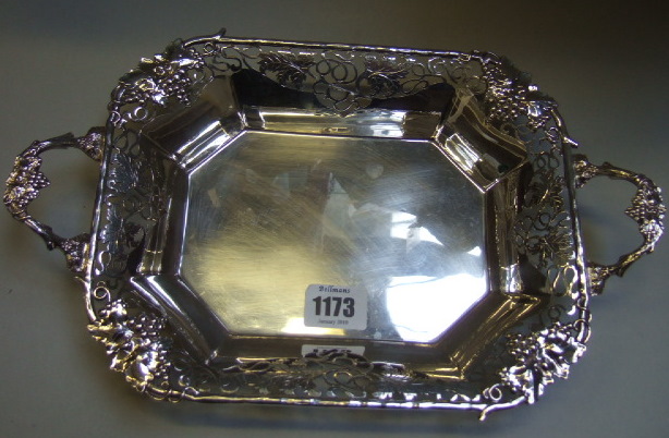 Appraisal: A silver shaped rectangular twin handled basket pierced and cast