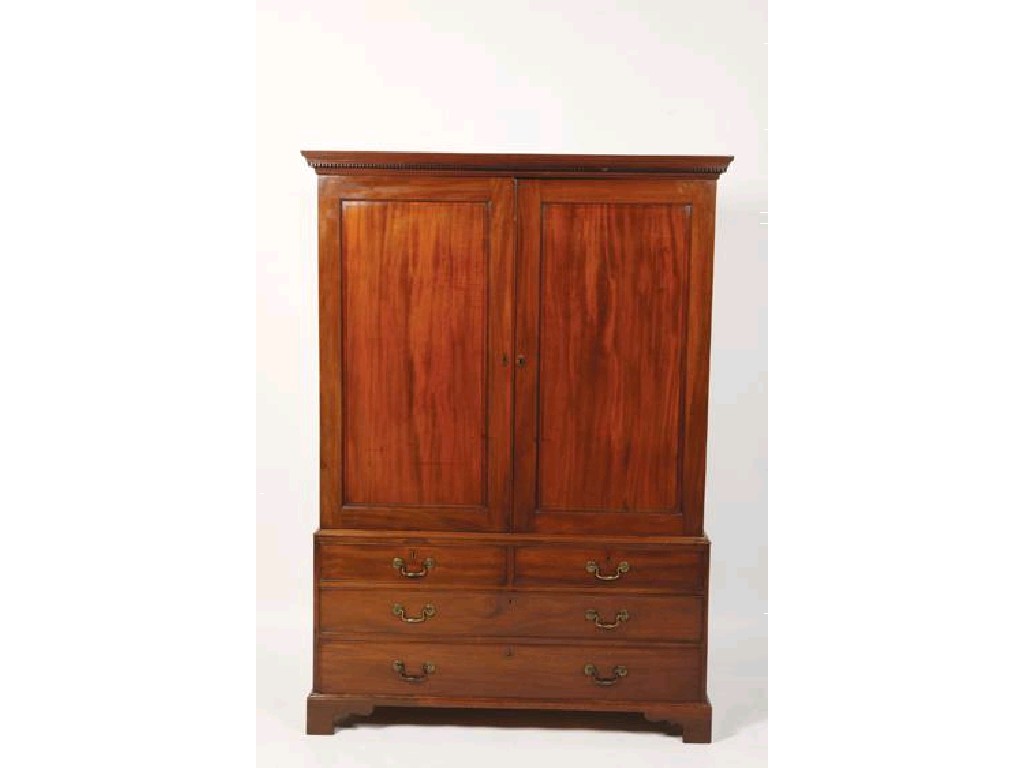 Appraisal: A GEORGE III MAHOGANY LINEN PRESS with a moulded and