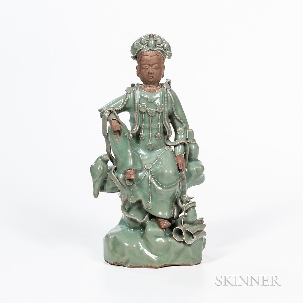 Appraisal: Celadon-glazed Figure of Guanyin Celadon-glazed Figure of Guanyin China possibly