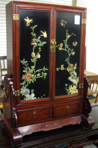 Appraisal: CHINESE ROSEWOOD TABLE CABINET ON STAND The small double-door cabinet