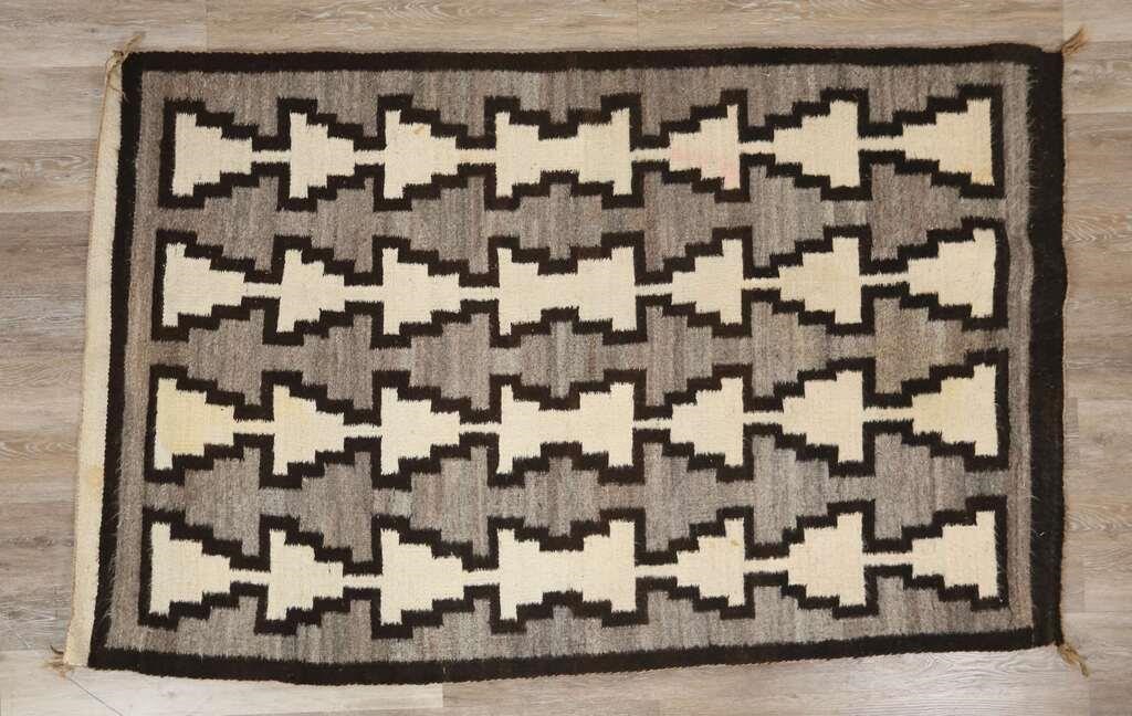 Appraisal: Navajo style rug th century Geometric dark brown and white