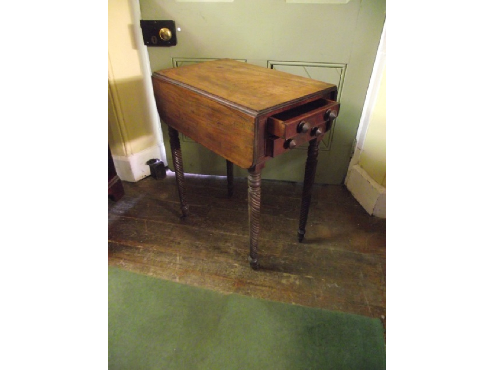 Appraisal: A Victorian mahogany lady's sewing table with two real and