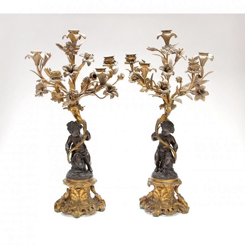 Appraisal: Pair of Continental Bronze Figural Candelabra late th century gilt