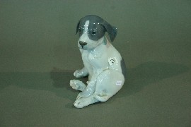 Appraisal: A Royal Copenhagen model of a puppy