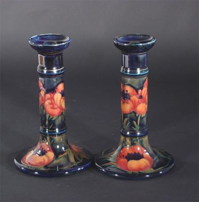 Appraisal: Big Poppy' a pair of Moorcroft Pottery candlesticks designed by