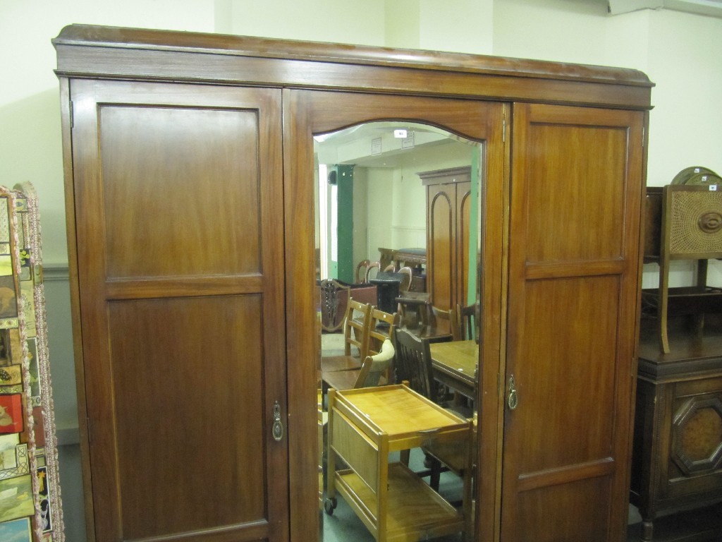 Appraisal: Edwardian mahogany triple door wardrobe