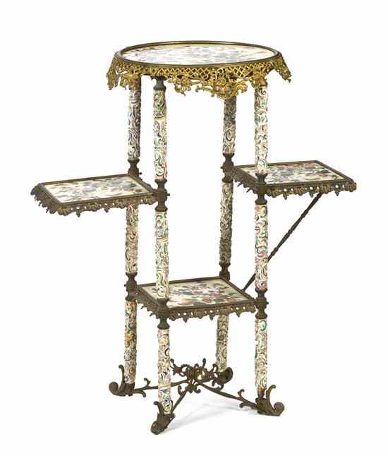 Appraisal: A Continental Faience and Gilt Metal Mounted Etagere having a