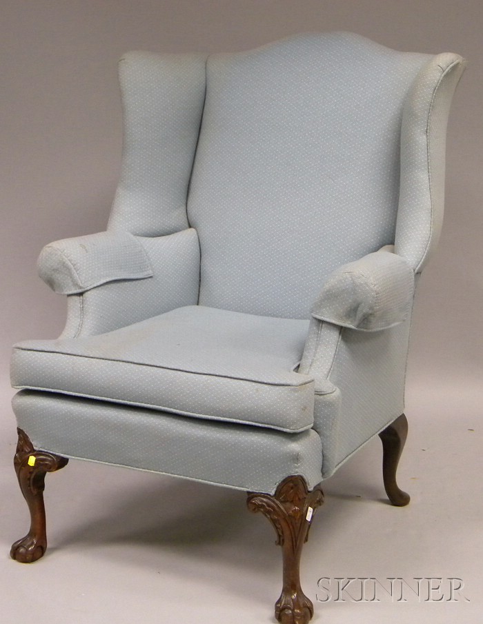 Appraisal: Chippendale Rococo-style Upholstered Carved Mahogany Wing Chair