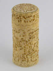 Appraisal: A Chinese finely carved ivory cylindrical box with pierced screw