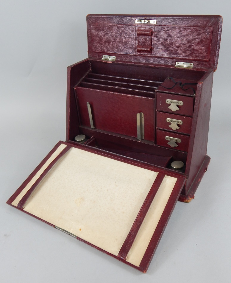 Appraisal: An Edwardian leather and silver plated desk stand the hinged