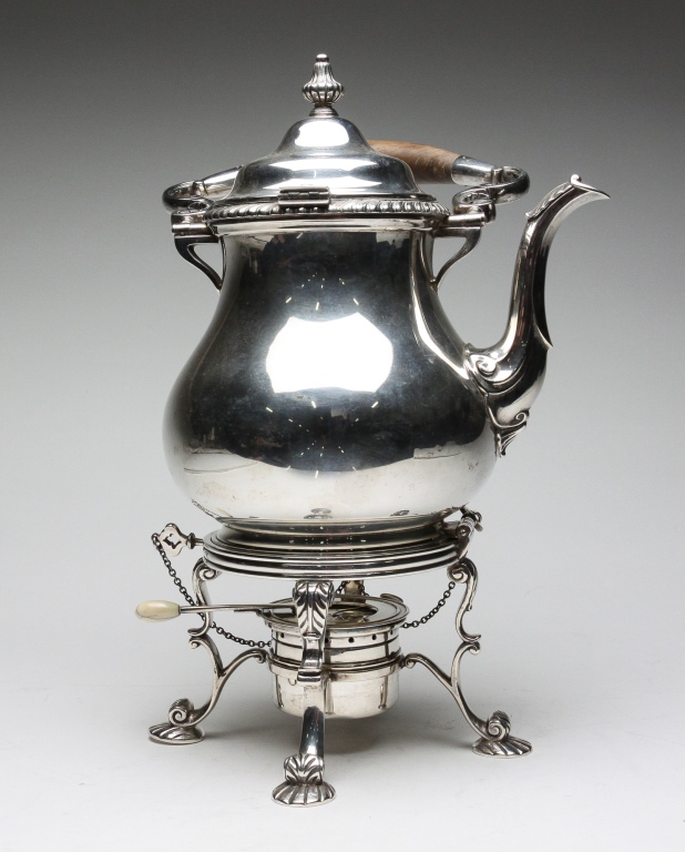 Appraisal: American fourth quarter th century Pear-shaped kettle with hinged lid