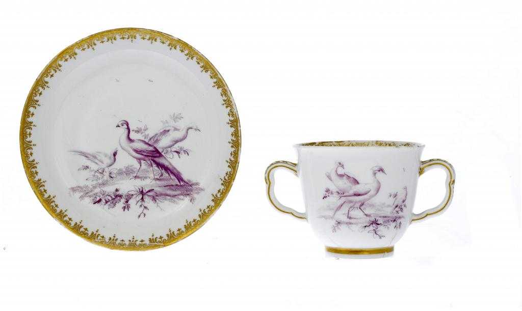 Appraisal: A CHELSEA TWO HANDLED CAUDLE CUP AND SAUCER finely painted