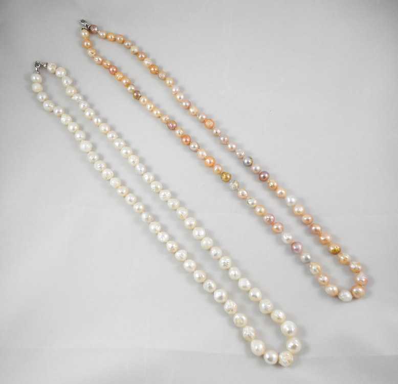 Appraisal: TWO OPERA LENGTH BAROQUE PEARL NECKLACES including a inch necklace