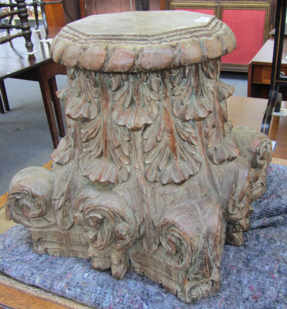 Appraisal: A pair of carved hardwood column capitals of acanthus scroll