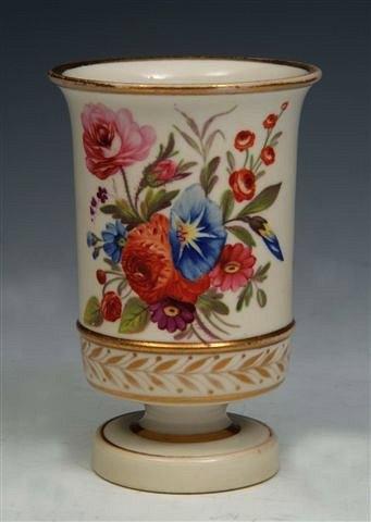 Appraisal: A SPILL VASE probably Nantgarw painted with a spray of