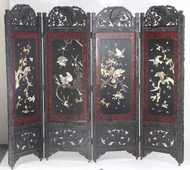 Appraisal: A Japanese lacquer four-fold screen decorated birds and foliage in