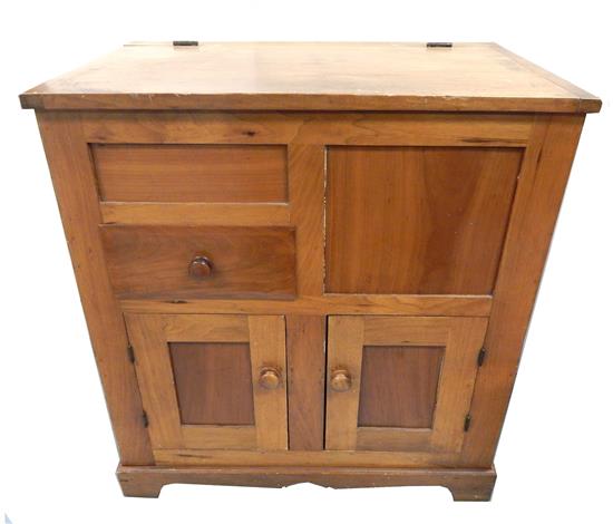 Appraisal: th th C commode pine with tan finish lift top