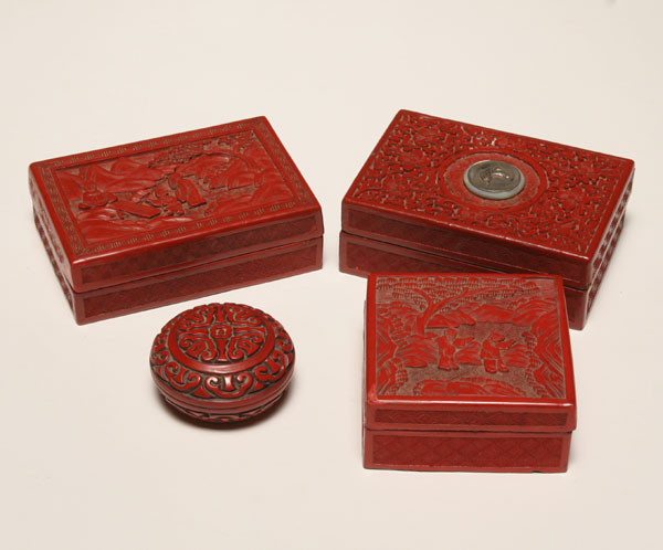 Appraisal: Four carved cinnabar boxes all with matched geometric carving on