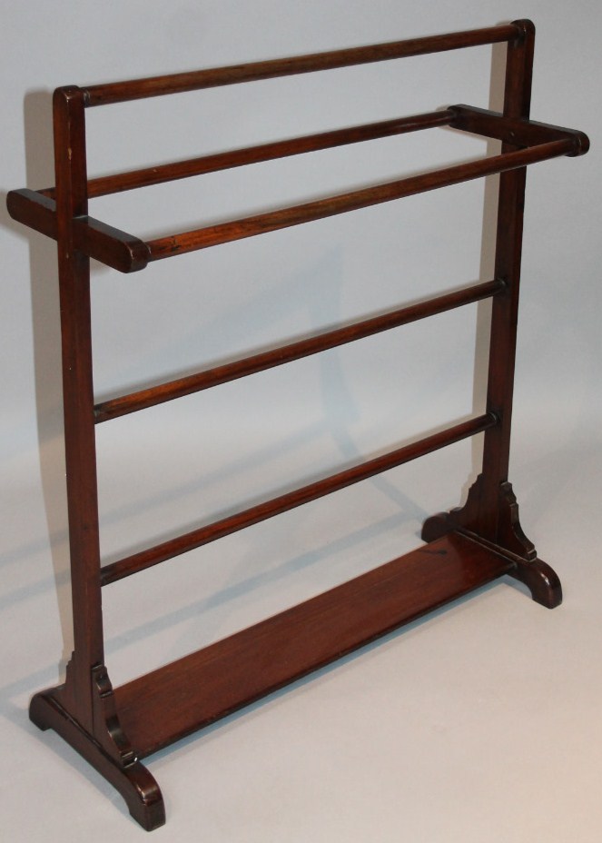 Appraisal: An early thC mahogany framed clothes horse with five cylindrical