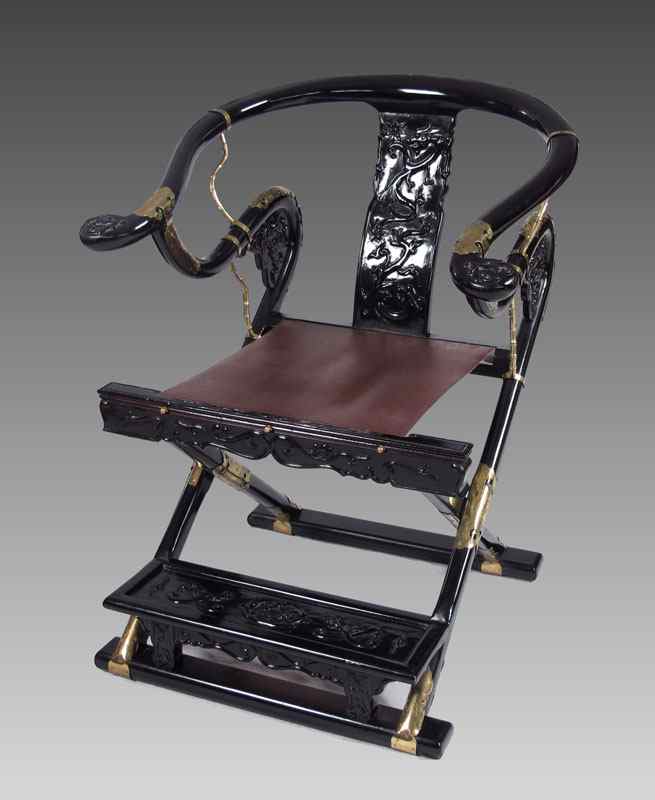 Appraisal: BRASS MOUNTED CHINESE BLACK LACQUER FOLDING CHAIR U shaped top