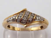 Appraisal: A yellow metal tests gold diamond ring marked for approx