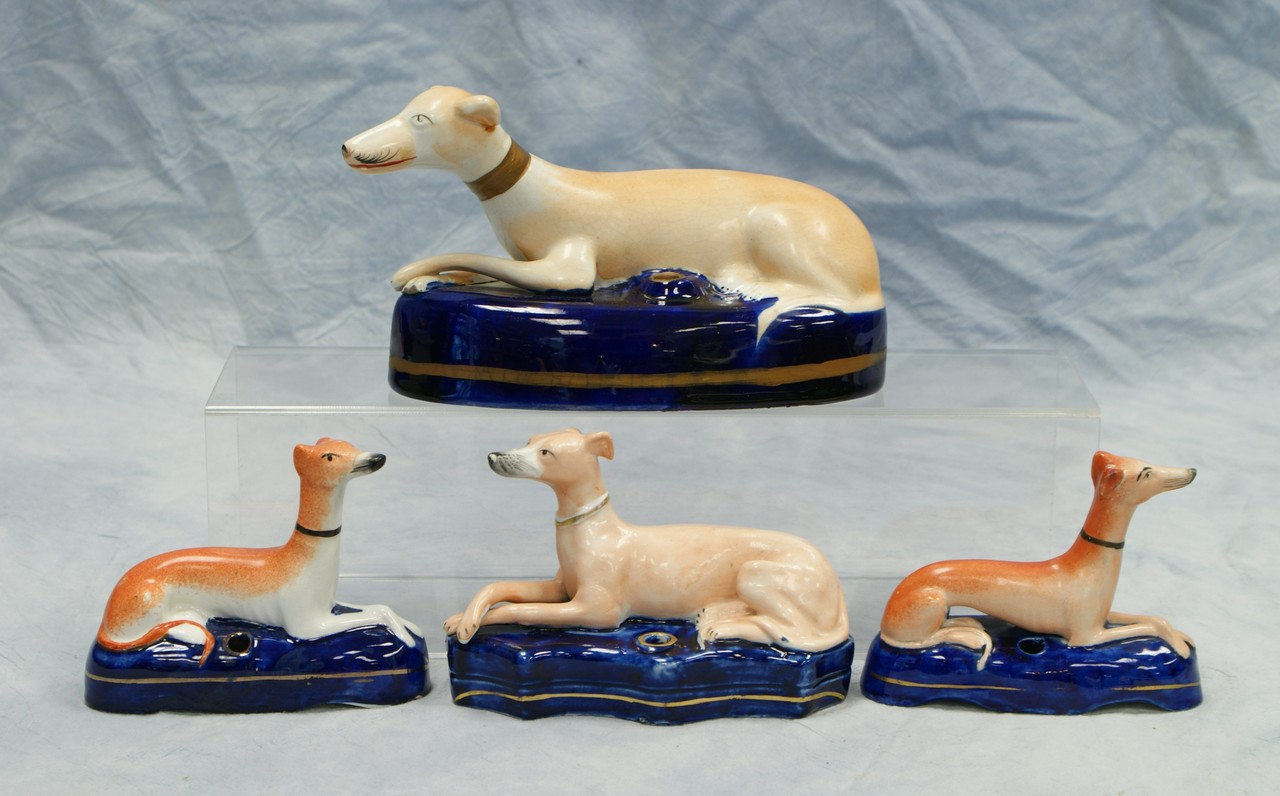 Appraisal: Staffordshire greyhound inkwells l no damage