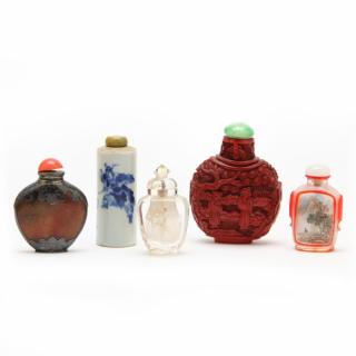 Appraisal: Five Chinese Snuff Bottles including a carved rock crystal bottle