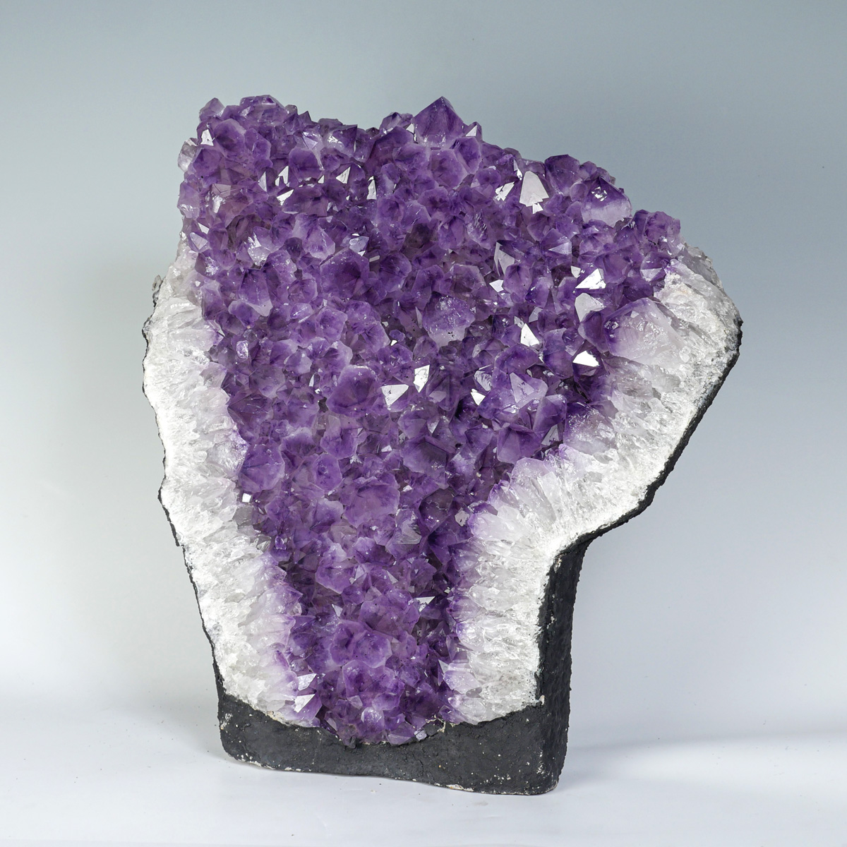 Appraisal: LARGE AMETHYST GEODE SPECIMEN Large Amethyst geode specimen with an